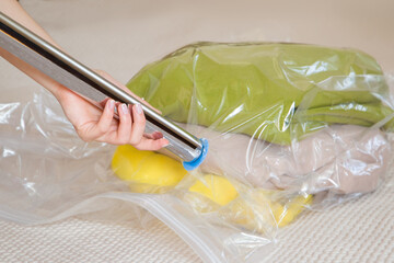 vacuum bag for clothes, vacuum process. vacuum clothing storage compressed package