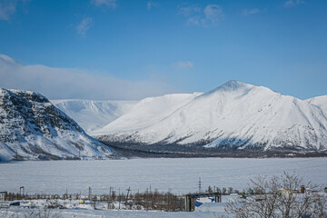 Fototapeta na wymiar Northern spring city winter landscape