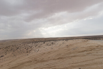 sand dunes and clouds