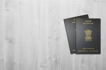 India passport on a white wooden background, issued to Indian citizens, space for copying