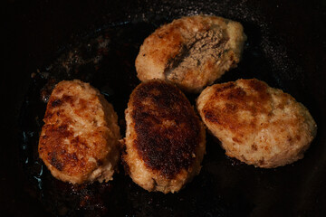 Meat cutlet with liver inside.Cutlets are fried in a frying pan.Close-up