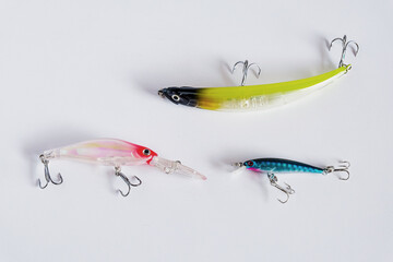 Fishing lures sport equipment on white.