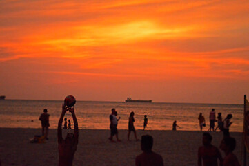 playing ball at the beach