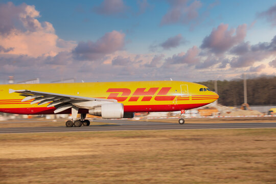 Frankfurt, Germany - 25.03.2021- airplane from german dhl in departure from airport frankfurt main with cloudy wheather