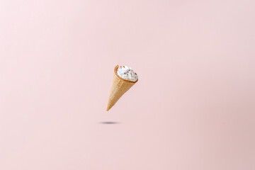 abstract ice cream cone isolated on the color surface