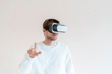 young man using futuristic virtual reality glasses, vr technology