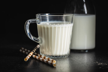 White milk in glass cup.