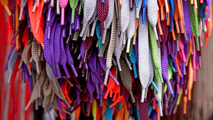 Bright colorful shoelaces at a street market in Valencia