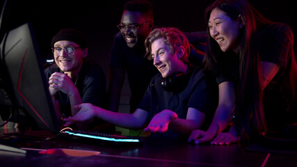 Friends came to the computer club to play together, choose a game, slow motion