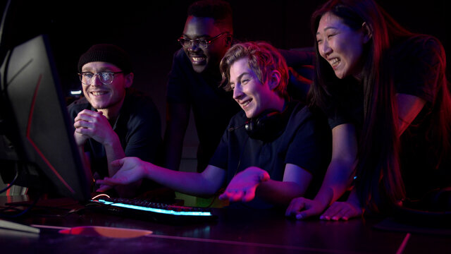 Friends came to the computer club to play together, choose a game, slow motion