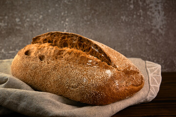 Wholegrain rye bread on a cutting board