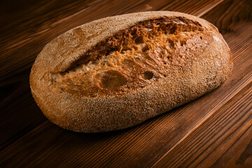 Wholegrain rye bread on a cutting board
