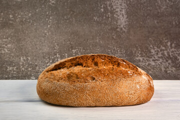 Wholegrain rye bread on a cutting board