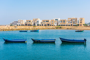Fototapeta na wymiar Three traditional boats in the harbor of Rabat, Morocco