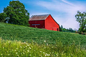 Red barn in the hills