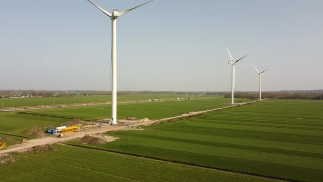 Construction of a new wind park with a row of large windturbines near the Hattemerbroek junction next to the N50 highway in Gelderland, The Netherlands.