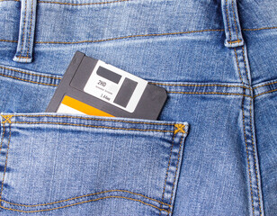 Old format floppy disk in the back pocket of the jeans