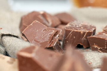 broken and crumbled natural bitter chocolate