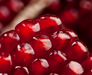 fresh pomegranate seeds on the kitchen table
