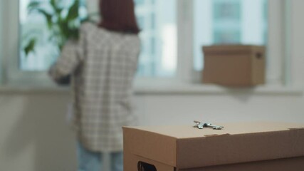  Girl transports things to a new studio apartment