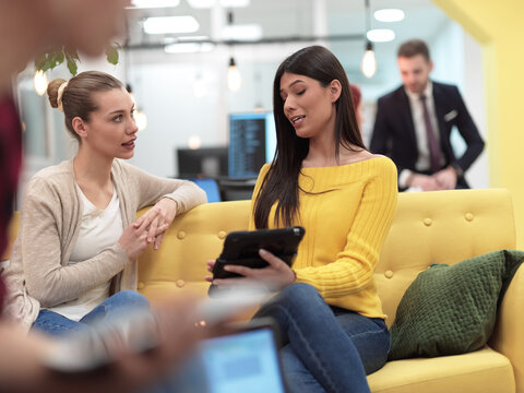 female friends discussion about project at moder coworking office