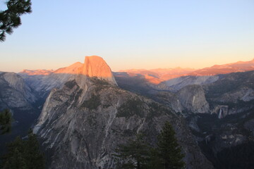 Fototapeta premium Sunset Half Dome view from Glacier Point in Yosemite National Park, California