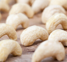 Fototapeta premium fresh raw cashew nuts on the kitchen table