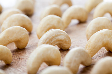 beautiful bent cashew nuts, fresh raw cashew