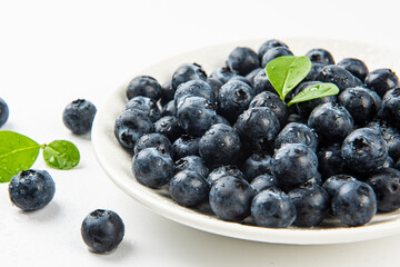 Water drops on ripe sweet blueberry. Fresh blueberries background