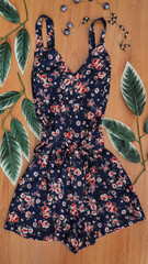 Flowered dress on wood texture