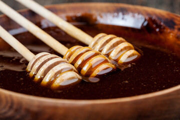 sweet bee honey and three spoons