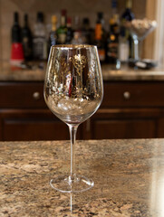 Wine glass with in home kitchen bar