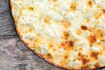 uneven beautiful round pastry made of flour with filling