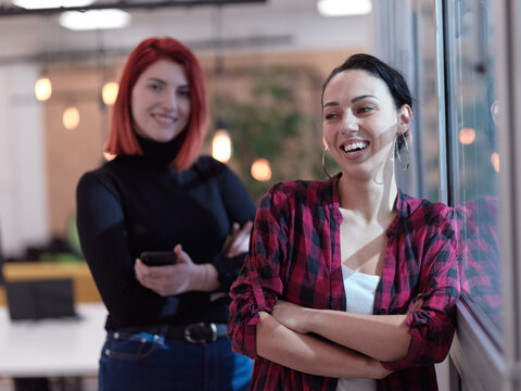 female friends discussion about project at moder coworking office