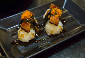Unagi Maki on the plastic tray.
