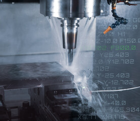 Fototapeta premium CNC milling machine cutting workpiece with coolant. CNC programming code. Industrial manufacturing metalwork 