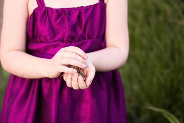 person holding a bunch of flowers
