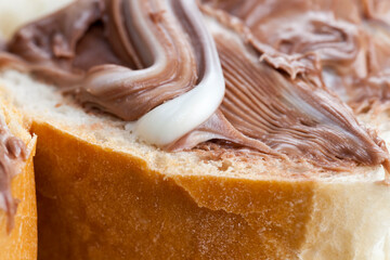 natural cocoa chocolate paste during Breakfast, white bread