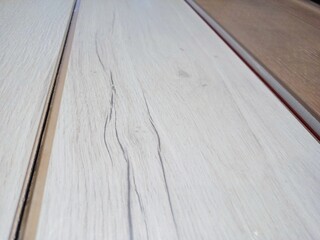Laminated boards in a package. Floor coverings in packs.