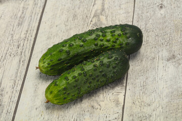 Ripe fresh green two cucumbers