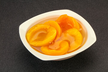 Marinated peaches fruit in the bowl