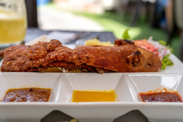 Cuy: a very special traditional Peruvian dish. Exotic food from Peru.