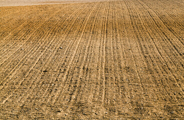 plowed fertile soil is an agricultural field