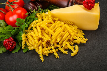 Raw Italian pasta Fusilli for cooking