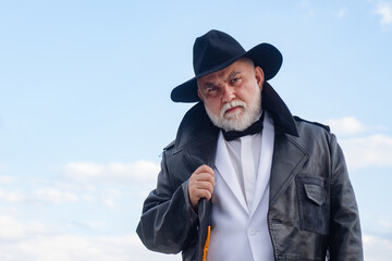 Handsome fashion senior old mature man. Elderly mature greybeard. Close up face portrait of senior....