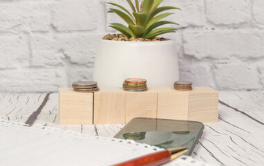 Stock market, coins, calculator, notepad, pen, and smartphone and financial chart. Abstract Business background