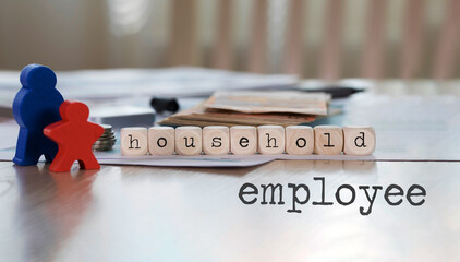 Words HOUSEHOLD EMPLOYEE depicted on the picture. Colorful wooden figurines and money in hte...