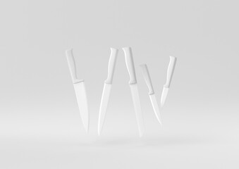 White Kitchen knives floating in white background. minimal concept idea creative. monochrome. 3D render.