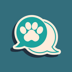 Green Paw print icon isolated on green background. Dog or cat paw print. Animal track. Long shadow style. Vector