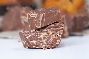 natural edible chocolate, broken into pieces and crumbs